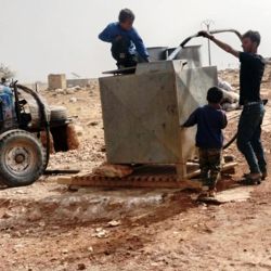 Drinkwatertank vullen in kamp