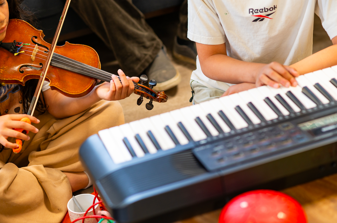Video van Muziekworkshop op AZC maken